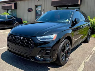 Black Audi SUV after a detail, side view