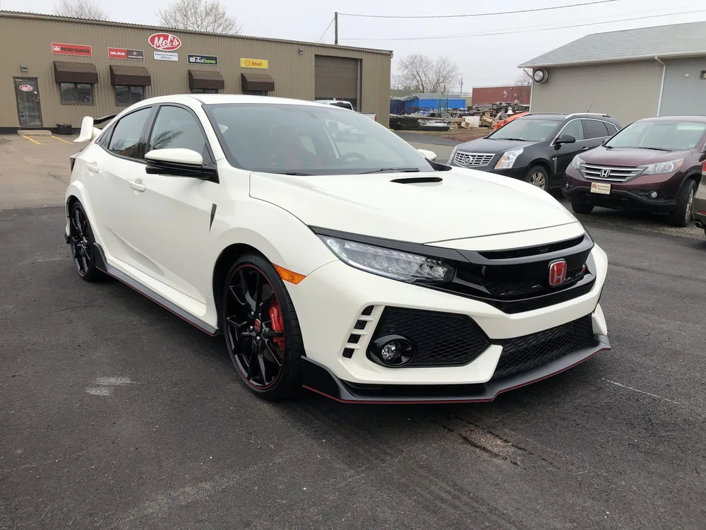 White Honda Civic Type R outside the CarShine shop