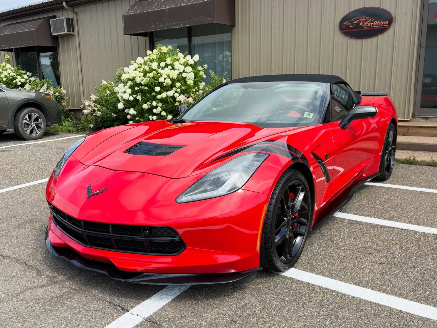 Red Corvette after a complete detail and sealant protection