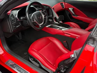 Red Corvette after a complete detail and sealant protection, rear view