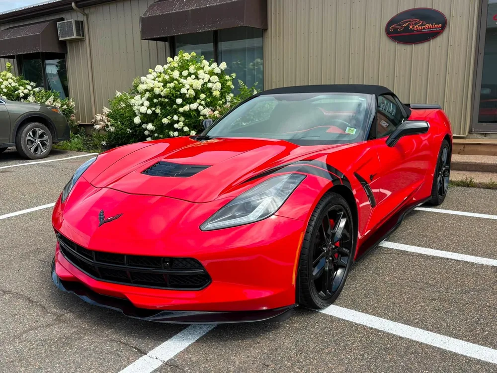 Red Corvette C7 convertible after a detail