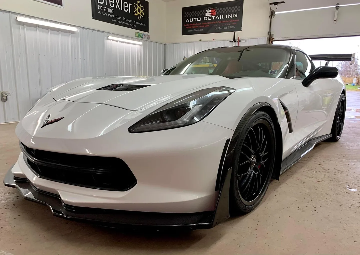 White Corvette C7 inside the CarShine shop