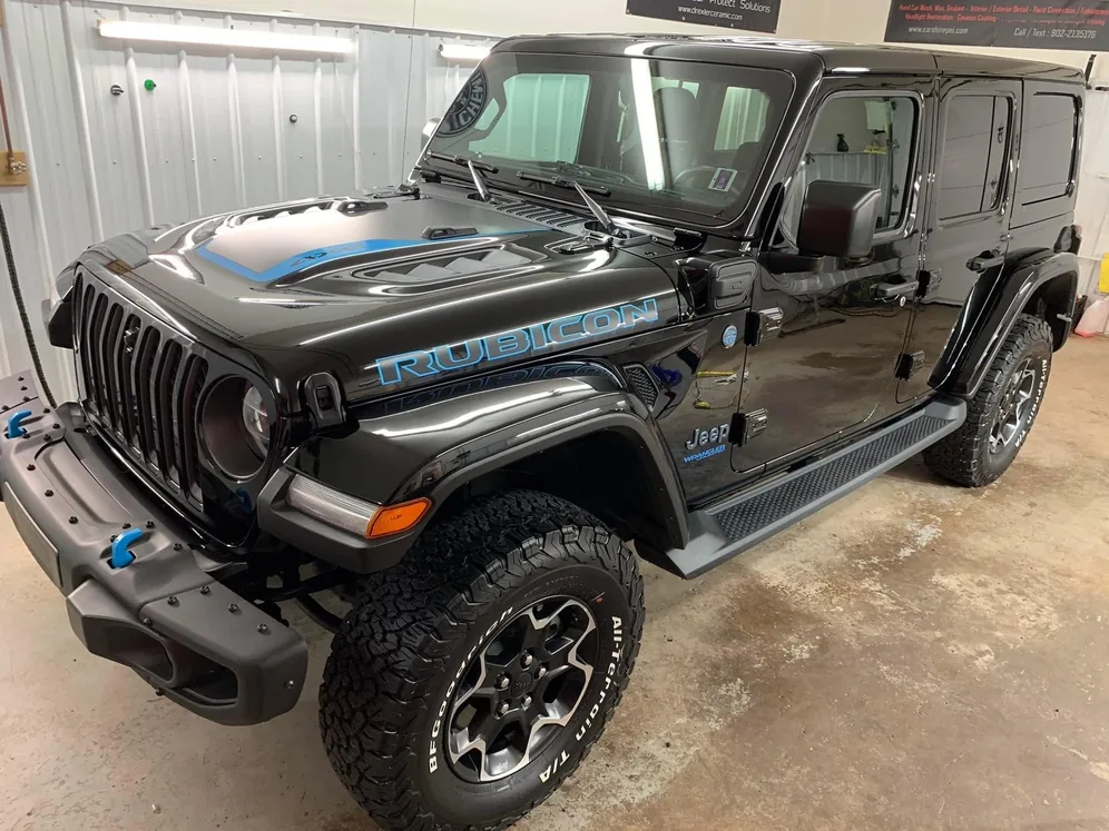 Black Jeep Wrangler 4xe inside the CarShine shop after a detail