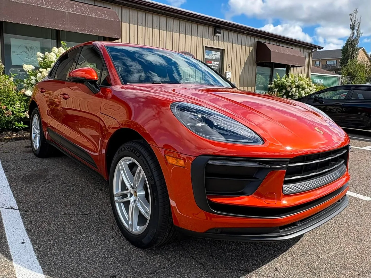 Orange Porsche Macan after a detail