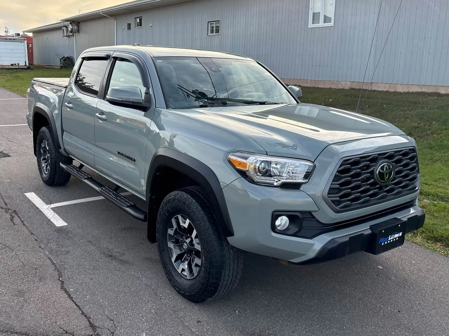 Grey Toyota Tacoma pickup after a detail, front three-quarter view